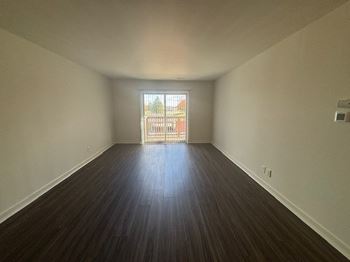 Living room featuring vinyl plank flooring.